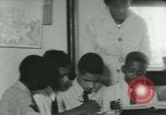 Image of African American children New Orleans Louisiana USA, 1937, second 4 stock footage video 65675075661