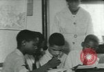 Image of African American children New Orleans Louisiana USA, 1937, second 5 stock footage video 65675075661