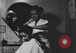Image of African American beautician Atlanta Georgia USA, 1939, second 3 stock footage video 65675075666