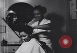 Image of African American beautician Atlanta Georgia USA, 1939, second 4 stock footage video 65675075666