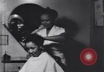Image of African American beautician Atlanta Georgia USA, 1939, second 6 stock footage video 65675075666