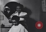 Image of African American beautician Atlanta Georgia USA, 1939, second 7 stock footage video 65675075666