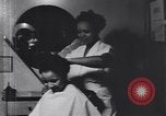 Image of African American beautician Atlanta Georgia USA, 1939, second 8 stock footage video 65675075666