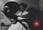 Image of African American beautician Atlanta Georgia USA, 1939, second 9 stock footage video 65675075666
