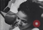 Image of African American beautician Atlanta Georgia USA, 1939, second 13 stock footage video 65675075666