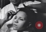 Image of African American beautician Atlanta Georgia USA, 1939, second 28 stock footage video 65675075666