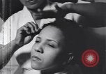 Image of African American beautician Atlanta Georgia USA, 1939, second 29 stock footage video 65675075666
