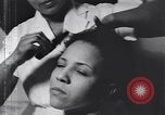 Image of African American beautician Atlanta Georgia USA, 1939, second 30 stock footage video 65675075666