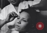 Image of African American beautician Atlanta Georgia USA, 1939, second 31 stock footage video 65675075666