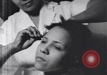 Image of African American beautician Atlanta Georgia USA, 1939, second 32 stock footage video 65675075666