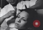 Image of African American beautician Atlanta Georgia USA, 1939, second 33 stock footage video 65675075666