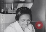 Image of African American beautician Atlanta Georgia USA, 1939, second 21 stock footage video 65675075667