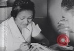 Image of African American beautician Atlanta Georgia USA, 1939, second 27 stock footage video 65675075667