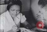Image of African American beautician Atlanta Georgia USA, 1939, second 28 stock footage video 65675075667