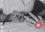 Image of African American beautician Atlanta Georgia USA, 1939, second 44 stock footage video 65675075667