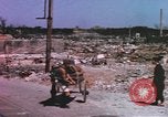 Image of bombed-out city Japan, 1945, second 62 stock footage video 65675075691