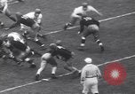 Immagine di USC contro Notre Dame del gioco del calcio South Bend Indiana USA, 1939, secondo 31 filmato di repertorio 65675075702