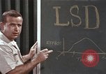 Image of effects of LSD drug use United States USA, 1967, second 22 stock footage video 65675075707