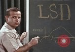 Image of effects of LSD drug use United States USA, 1967, second 27 stock footage video 65675075707