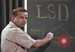 Image of effects of LSD drug use United States USA, 1967, second 32 stock footage video 65675075707