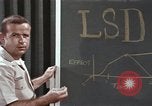 Image of effects of LSD drug use United States USA, 1967, second 36 stock footage video 65675075707