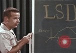 Image of effects of LSD drug use United States USA, 1967, second 39 stock footage video 65675075707