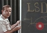 Image of effects of LSD drug use United States USA, 1967, second 42 stock footage video 65675075707