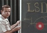 Image of effects of LSD drug use United States USA, 1967, second 43 stock footage video 65675075707