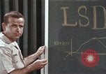 Image of effects of LSD drug use United States USA, 1967, second 44 stock footage video 65675075707