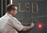 Image of effects of LSD drug use United States USA, 1967, second 49 stock footage video 65675075707