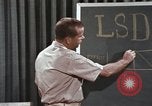 Image of effects of LSD drug use United States USA, 1967, second 55 stock footage video 65675075707