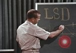 Image of effects of LSD drug use United States USA, 1967, second 57 stock footage video 65675075707