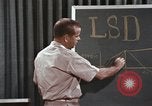 Image of effects of LSD drug use United States USA, 1967, second 59 stock footage video 65675075707