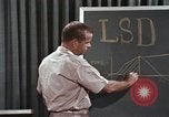 Image of effects of LSD drug use United States USA, 1967, second 62 stock footage video 65675075707