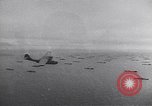 Image of PBY flying above a supply convoy in the Atlantic European Theater, 1944, second 1 stock footage video 65675075784