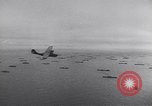 Image of PBY flying above a supply convoy in the Atlantic European Theater, 1944, second 4 stock footage video 65675075784