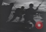 Image of PBY flying above a supply convoy in the Atlantic European Theater, 1944, second 44 stock footage video 65675075784
