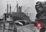 Image of Transport ships being loaded with troops and supplies for invasion task force United States USA, 1944, second 3 stock footage video 65675075793