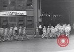 Image of Transport ships being loaded with troops and supplies for invasion task force United States USA, 1944, second 8 stock footage video 65675075793