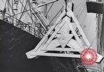 Image of Transport ships being loaded with troops and supplies for invasion task force United States USA, 1944, second 11 stock footage video 65675075793