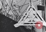 Image of Transport ships being loaded with troops and supplies for invasion task force United States USA, 1944, second 12 stock footage video 65675075793