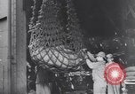 Image of Transport ships being loaded with troops and supplies for invasion task force United States USA, 1944, second 13 stock footage video 65675075793