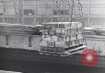 Image of Transport ships being loaded with troops and supplies for invasion task force United States USA, 1944, second 17 stock footage video 65675075793