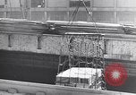 Image of Transport ships being loaded with troops and supplies for invasion task force United States USA, 1944, second 19 stock footage video 65675075793