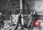 Image of Transport ships being loaded with troops and supplies for invasion task force United States USA, 1944, second 23 stock footage video 65675075793