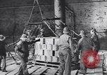 Image of Transport ships being loaded with troops and supplies for invasion task force United States USA, 1944, second 24 stock footage video 65675075793