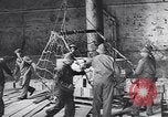 Image of Transport ships being loaded with troops and supplies for invasion task force United States USA, 1944, second 25 stock footage video 65675075793