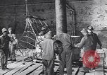 Image of Transport ships being loaded with troops and supplies for invasion task force United States USA, 1944, second 26 stock footage video 65675075793