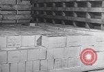 Image of Transport ships being loaded with troops and supplies for invasion task force United States USA, 1944, second 27 stock footage video 65675075793
