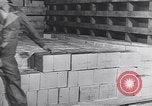 Image of Transport ships being loaded with troops and supplies for invasion task force United States USA, 1944, second 29 stock footage video 65675075793